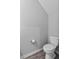 Contemporary half-bathroom with toilet and light gray walls at 3926 Palazzo Pl, Winter Haven, FL 33884