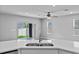 Modern kitchen sink and faucet with a large sliding glass door leading to the backyard at 3926 Palazzo Pl, Winter Haven, FL 33884