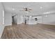 Large open-concept living area with modern finishes, sleek flooring, and plenty of natural light at 3926 Palazzo Pl, Winter Haven, FL 33884