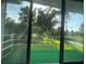Relaxing balcony overlooking a lush golf course and natural landscape at 416 Howard Ave # D, Lakeland, FL 33815