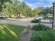Paved parking area with several parked cars and well-maintained landscaping at 416 Howard Ave # D, Lakeland, FL 33815