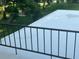 Balcony view of green space, trees, and pond at 416 Howard Ave # D, Lakeland, FL 33815