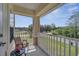 Cozy balcony with a seating area, providing a peaceful outdoor space to relax at 4899 Meadow Dr, St Cloud, FL 34772