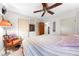 Bright bedroom featuring a cozy bed, ample storage, and neutral decor for a peaceful retreat at 517 Carolina Ave, St Cloud, FL 34769