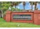 Community sign for Regency Pointe in front of brick wall at 600 Regency Way, Kissimmee, FL 34758