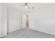 The bedroom features neutral walls, carpeted floors, a ceiling fan, and an closet at 726 Irvine Ranch Rd, Kissimmee, FL 34759