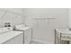 The laundry room has a washer, dryer, and utility sink at 726 Irvine Ranch Rd, Kissimmee, FL 34759