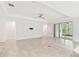 Spacious living room with tile flooring, recessed lighting, sliding doors, and a ceiling fan at 726 Irvine Ranch Rd, Kissimmee, FL 34759