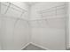 Walk-in closet is equipped with shelving for optimal organization at 726 Irvine Ranch Rd, Kissimmee, FL 34759