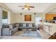 Inviting living room featuring comfortable seating, tile floors, and decorative wall art at 737 Oxford Dr, Davenport, FL 33897