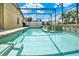 Inviting in-ground pool with a screened enclosure and clear blue water at 737 Oxford Dr, Davenport, FL 33897