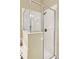 Clean bathroom with a glass enclosed shower at 737 Oxford Dr, Davenport, FL 33897