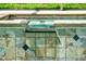 Close-up of the backyard inground spa with decorative tile at 737 Oxford Dr, Davenport, FL 33897