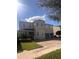 Charming two-story home boasts a well-manicured lawn and a spacious two-car garage at 7616 Brookhurst Ln, Kissimmee, FL 34747