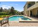 Beautiful pool and hot tub with brick patio and lounge chairs, perfect for outdoor relaxation and entertaining at 7616 Brookhurst Ln, Kissimmee, FL 34747