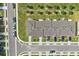 An aerial view of townhomes showcasing landscaping, parking, and architectural design in a well-planned community at 955 Grandin St, Davenport, FL 33837