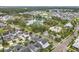 Gorgeous aerial view of a Primary-planned community with picturesque homes, lush landscaping, a pool, and serene lakes at 960 Civitas Way, Winter Garden, FL 34787