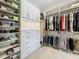 Walk-in closet with custom shelving and drawers for optimal organization at 960 Civitas Way, Winter Garden, FL 34787