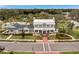 Stunning exterior of a community clubhouse, featuring elegant architecture, lush landscaping, and a welcoming entrance at 960 Civitas Way, Winter Garden, FL 34787