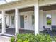 Inviting front porch with comfortable seating and lush landscaping creating a welcoming entrance at 960 Civitas Way, Winter Garden, FL 34787