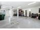 Large garage with epoxy flooring and ample storage and work space at 960 Civitas Way, Winter Garden, FL 34787