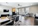 Spacious office with dual workstations, ceiling fan, and natural light from multiple windows at 960 Civitas Way, Winter Garden, FL 34787