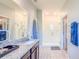 Updated bathroom with glass shower, dual sinks and granite countertops at 1021 Golden Dawn Loop, Minneola, FL 34715