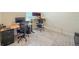 Bright office features wood-look floors, plenty of space and natural light at 1021 Golden Dawn Loop, Minneola, FL 34715
