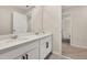 Bright bathroom featuring double vanity, quartz countertop, and modern fixtures at 11844 Founders St, Orlando, FL 32832