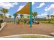 Brightly colored playground with a sunshade, various play structures, and soft landing at 11844 Founders St, Orlando, FL 32832