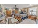 Spacious bedroom features large windows, hardwood furniture and ceiling fan at 12542 Idaho Woods Ln, Orlando, FL 32824