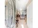 Inviting foyer with tiled floor and a clear view into the living room with elegant furnishings at 12542 Idaho Woods Ln, Orlando, FL 32824