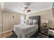 Cozy bedroom with a padded headboard, and neutral tones offering a relaxing private space at 12542 Idaho Woods Ln, Orlando, FL 32824