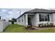 Charming single-story home with a manicured lawn and neat landscaping at 1292 Hilltop Pl, St Cloud, FL 34772