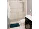Bathroom featuring a modern shower with glass door and sleek vanity at 153 Taft Dr, Davenport, FL 33837
