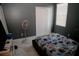 Well lit bedroom with fan and large closet, featuring modern marble floors at 153 Taft Dr, Davenport, FL 33837