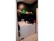 A practical laundry room with a washer and dryer, complemented by storage on a wire rack at 153 Taft Dr, Davenport, FL 33837