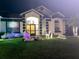 Charming single-Gathering home with holiday decorations and well-maintained landscaping at 216 Boxwood Dr, Davenport, FL 33837