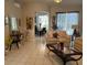 Inviting living room with neutral tones, stylish decor, and easy access to the dining area at 216 Boxwood Dr, Davenport, FL 33837