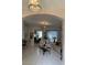Bright living room featuring tile floors, modern furniture, and an open layout at 216 Boxwood Dr, Davenport, FL 33837