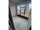 Screened porch featuring a view of the fenced backyard at 2242 Seven Oaks Dr, St Cloud, FL 34772