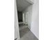 Hallway with tile flooring and doors to other rooms at 2505 Merseyside Ct, Haines City, FL 33844