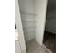 Neat walk-in closet featuring adjustable wire shelving for organized storage solutions at 2505 Merseyside Ct, Haines City, FL 33844