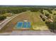 Golf course and tennis court aerial with parking at 2580 Gallardia Dr, Lake Wales, FL 33898