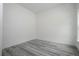Comfortable bedroom featuring gray vinyl floors and a neutral color palette, perfect for relaxation and rest at 2580 Gallardia Dr, Lake Wales, FL 33898