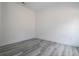 Neutral bedroom features gray vinyl floors and a neutral color palette, perfect for comfortable living at 2580 Gallardia Dr, Lake Wales, FL 33898