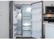 Spacious, stainless steel refrigerator with open doors, offering ample storage space at 2580 Gallardia Dr, Lake Wales, FL 33898