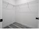 Walk-in closet with white walls and wire shelving for efficient storage at 2580 Gallardia Dr, Lake Wales, FL 33898