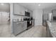 Updated kitchen featuring stainless steel appliances and neutral cabinets at 2726 Harmonia Hammock Rd, Harmony, FL 34773