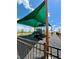 Community playground featuring modern play equipment under a shaded canopy, offering a safe outdoor space at 2860 Poppy Avenue, Haines City, FL 33844